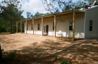 30x60x12, 6\' lean-to, lightstone walls, white roof and trim