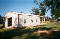 30x40x10, 20\' extended roof line, lightstone walls rustic red trim