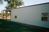 30x40x10, 20\' extended roof line, lightstone walls rustic red trim