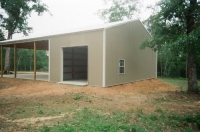 20x40x14, 40' extended roof line. Hickory moss walls, frost white roof and trim