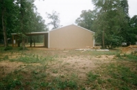 30x30x10, 10' extended roof line 20' lean-to. Saddle tan walls, white roof and trim.
